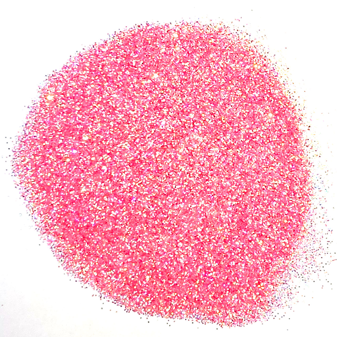 A pile of fine pink glitter on a plain white background.